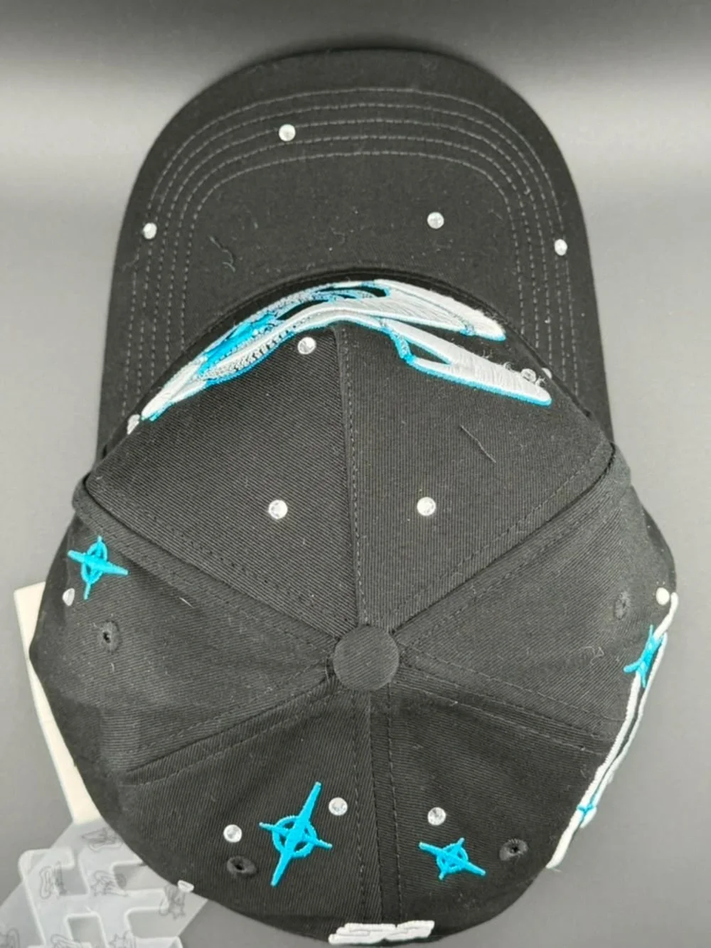 Black Baseball Cap with Blue & White Star Accent